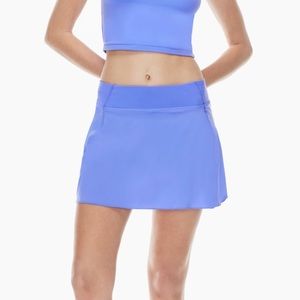 Never worn before! Adorable pink aritzia tennis skirt with liners under